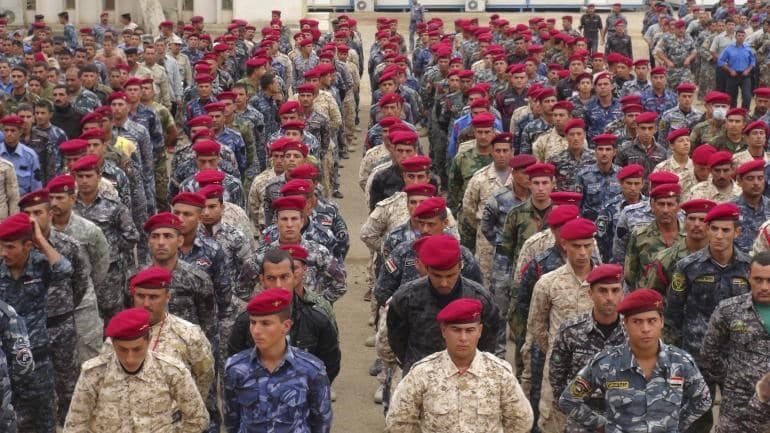 Sunni tribesmen take part in military training, as they prepare to fight against Islamic State militants, on the outskirts of Ramadi, west of Baghdad, Nov. 16, 2014. Reuters photo. 