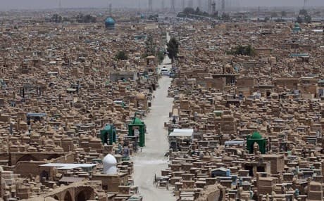 A general view of the Wadi al-Salam, or "Valley of Peace" cemetery in the Shiite holy city of Najaf, 100 miles (160 kilometers) south of Baghdad, Iraq, Tuesday, July 1, 2014. 