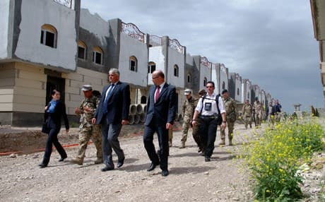 German State Secretary of Defense Markus Grübel tours an urban warfare training exercise conducted by foreign advisers for Peshmerga Saturday, April 11. Photo by Campbell MacDiarmid. 