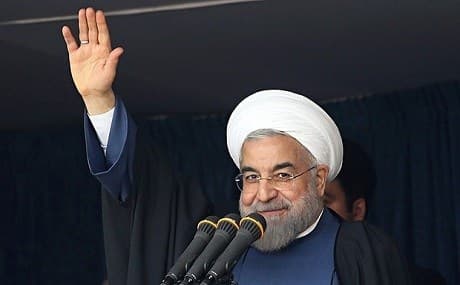  Hassan Rouhani waves to the crowd while giving a speech during a visit to Isfahan. Photo: AFP