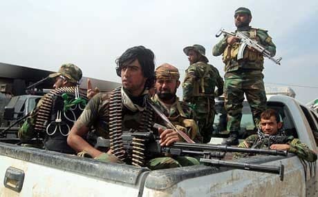  Militias of Hashd al-Shaabi during the military operation in the village of Albu Ajil, near the city of Tikri. AFP file Photo. 