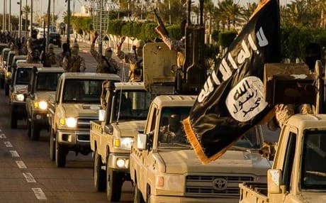 ISIS militants parade in Sirte, Libya. AP Photo. 