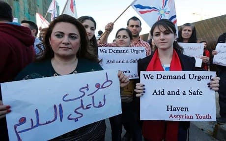 Assyrian refugees from Syria protest in Beirut in early 2015. Photo: AFP
