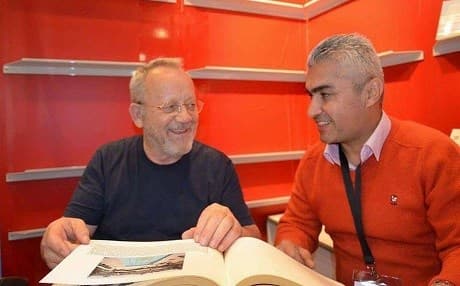 Edi Hubschmid (L) being interviewed by Kamaran Sobhan (R) at the Frankfurt Book Fair. Photo: Kamaran Sobhan/Facebook