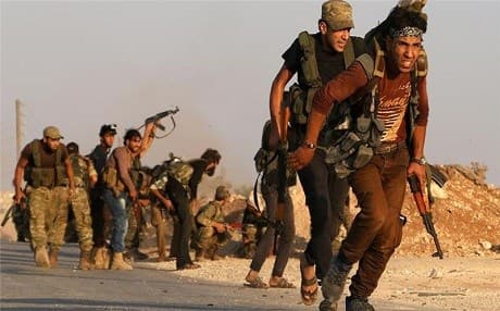 Turkish backed Syrian rebel fighters in their offensive against the positions of the so-called Islamic State in northern Syria. Photo: AFP