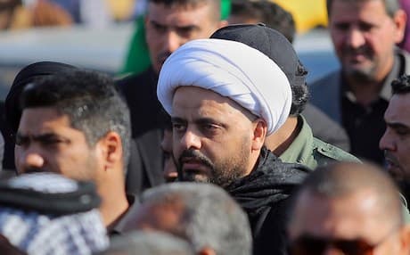 Qais Al-Khazal  (centre), the leader of the Shiite militia of  Asa’ib Ahl al-Haq attends funeral procession of six members of his militia who were killed in Tikrit fighting ISIS. AP photo