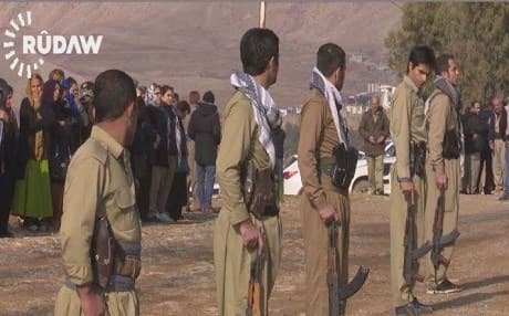 Peshmerga fighters from the Kurdistan Democratic Party-Iran (PDK) show respect to the fallen Peshmergas killed in Tuesday bombings in Koya, 70 km east of Erbil. Photo: Rudaw
