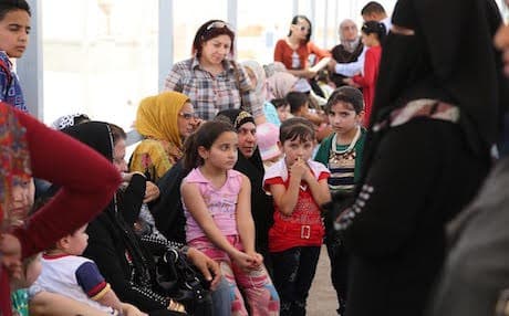 A number of IDPs at a Kirkuk check-point going through screening process. Photo: Rudaw