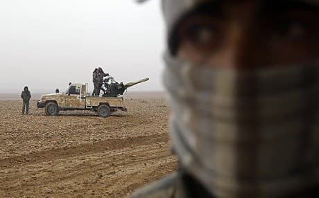 SDF fighters in the Raqqa countryside in mid-December 2016. Photo: Delil Souleiman/AFP