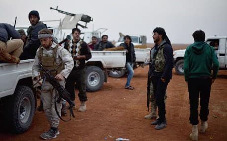 Free Syrian Army fighters arrive in al-Bab in Aleppo province. Photo: AA