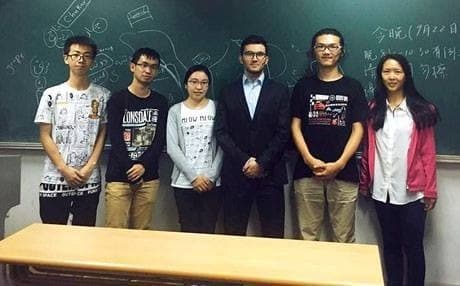 Harem Ali Hassan and his students at Peking University. 