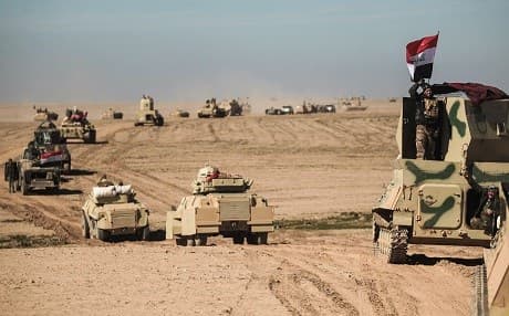 Iraqi forces pictured south of Mosul on Sunday.  Photo: AFP/Ahmad al-Rubaye