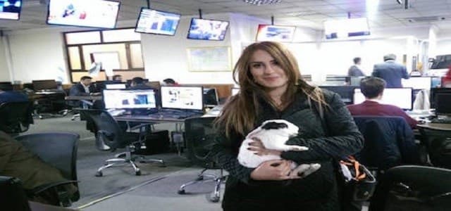 Shifa gardi holds in her hands a wounded rabbit she rescued in Mosul while she was covering the offesnive in February. Photo:Rudaw