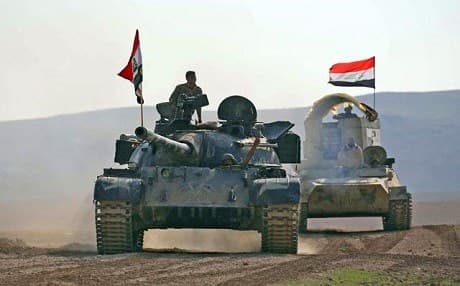 Iraqi forces in Badush on Tuesday. Photo: AFP