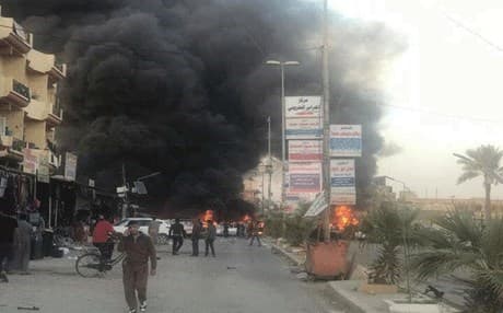The aftermath of the bombing in Tikrit's Physicians Street. Photo: Youtube screenshot 