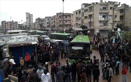 Evacuation process of rebel fighters and civilians from Waer district, western Homs, Syria on March 18, 2017. Photo: AA 