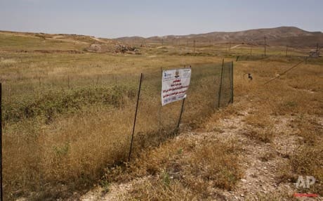 An area in the Shingal region where ISIS executed thousands of Yezidi men, then kidnapped women and children, shown in May 2016. Photo: AP