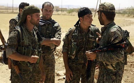 Fighters from the Syrian Democratic Forces gather on the outskirts of the northern Syrian town of Manbij. Photo: Delil Souleiman | AFP Photo