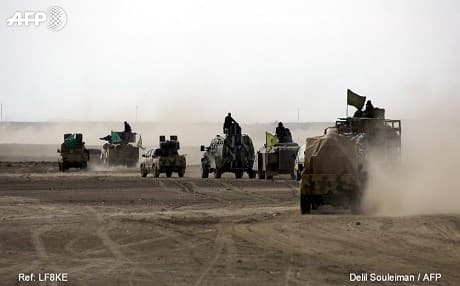 SDF forces north of Raqqa in February. Photo: Delil Souleiman/AFP