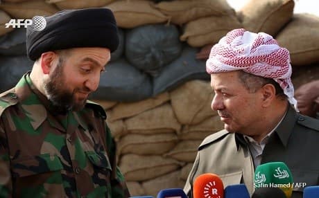 Kurdish President Masoud Barzani [R] and the head of the ruling Shiite National Alliance Ammar al-Hakim hold a joint press conference last October near Mosul where Iraqi and Kurdish forces launched a joint military operation to recapture Mosul from the ISIS group. Relations between the Kurdish and Shiite parties have historically been strong and friendly, especially with Hakim's Islamic Supreme Council. Photo: AFP. 