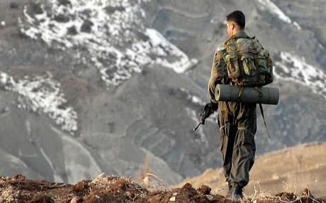 A Turkish soldier patrols an area of eastern Turkey. Photo: AA