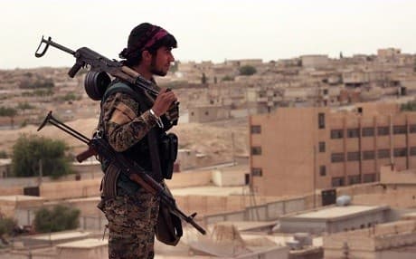 A member of the Syrian Democratic Forces (SDF) in Syria's Tabqa city, now under the contro of the mainly-Kurdish SDF forces. File photo: SDF handout via AP 
