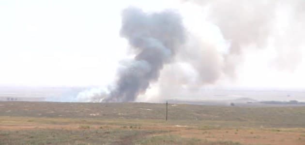 Plumes of smoke rising in the skyline of the Yezidi village of Tal banat, southeast of Shingal on Saturday as the mainly-Shiite Hashd al-Shaabi forces continued to push forward against the ISIS militants. Photo: Rudaw video. 