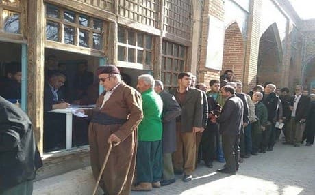 Kurdish voters head outside a polling station in Iranian Kurdistan wait to cast their vote. Photo: Mehr News Agency. 