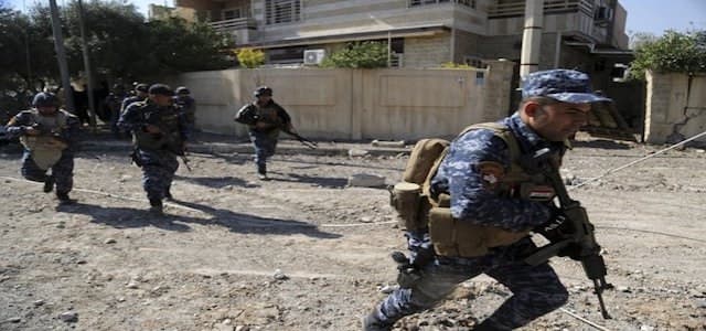 Iraqi security forces advance during fighting against ISIS in western Mosul. AP file photo