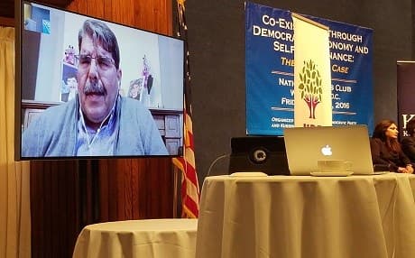 Salih Muslim, the co-leader of the PYD, speaks via teleconference at the National Press Club in Washington, D.C., on April 29, 2016. Photo: Chris Johannes | Rudaw