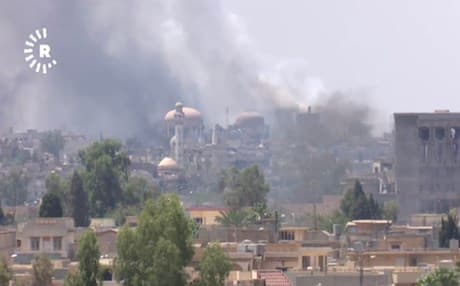A screen grab of  Rudaw video footage showing thick black smoke covering the skyline over the last four neighborhoods where ISIS is still present including Old Mosul, Zanjali, Shifa, and Bab al-Sinjar