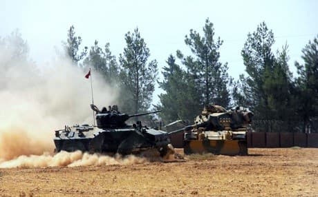 Turkish army tank and armoured vehicle near the Turkey-Syria border in August 2016. Photo: AP