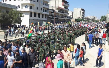 The demonstration is reportedly organized by the ruling Democratic Union Party (PYD) in Rojava or northern Syria. Photos by ANF