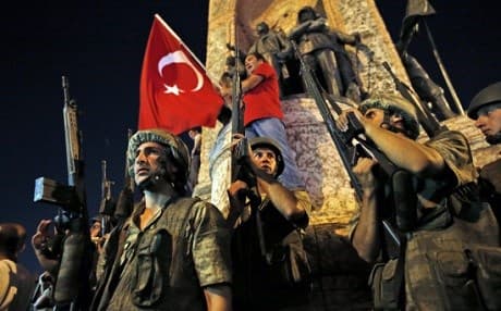Turkish soldiers and Erdogan supporters in Istanbul’s Taksim Square in the early hours of July 16, 2016. Photo: AFP