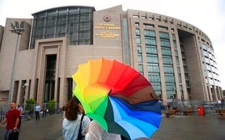 People walk outside the court in Istanbul on Monday. Ten Turkish human rights activists who were detained by police while attending a training workshop appeared before court officials in Istanbul on Monday to face possible charges or be released from custody. Photo: Lefteris Pitarakis | AP