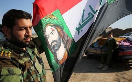 A Shiite militia fighter. Photo: Emad Matti/AP/file