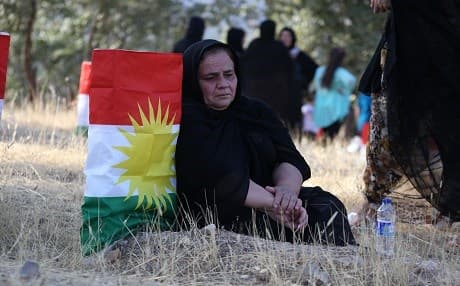 A Kurdish woman commemorates the anniversary of the Kurdish genocide, Anfal, in the Barzan area, Duhok province in 2016. File photo: Rudaw