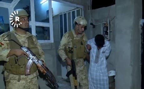 Kirkuk authorities arrest a suspected member of an ISIS sleeper cell in June. Photo: Rudaw video