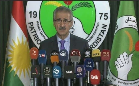 Mala Bakhtiyar, a senior member of the ruling Patriotic Union of Kurdistan (PUK) speaks to reporters on July 20, 2017 regarding the party's recent visit to Iran. Photo: Rudaw video