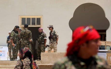 Fighters from northern Syria battle to oust ISIS from Raqqa. Photo: Delil Souleiman | Raqqa