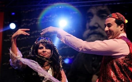 Two young people dance as they celebrate the Kurdish new year of Newroz celebrated each year in March. The local government in the multi-ethnic and oil rich Kirkuk raised the flag of Kurdistan officially for the first time in Newroz earlier in 2017. File photo: Rudaw
