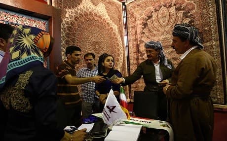 Rudaw's file photo shows an Iranian trade fair in the capital of the Kurdistan Region, Erbil, in August 2014.  Iran is Kurdistan Region’s second largest trade partner after Turkey, conducting $8billion of trade in 2014.