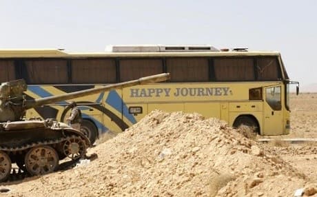 A bus waiting to transport ISIS fighters from the Syria-Lebanon border on August 28. Photo: AFP