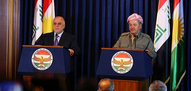 Iraqi Prime Mnister Haider al-Abadi [L] and Kurdish President Masoud Barzani hold a press conference in Erbil in 2013. File photo: Rudaw/Farzin Hassan 