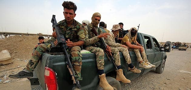 Members of the Iraqi forces make their way to the front line on September 21, 2017. Photo: AFP/Ahmad al-Rubaye/alternative crop