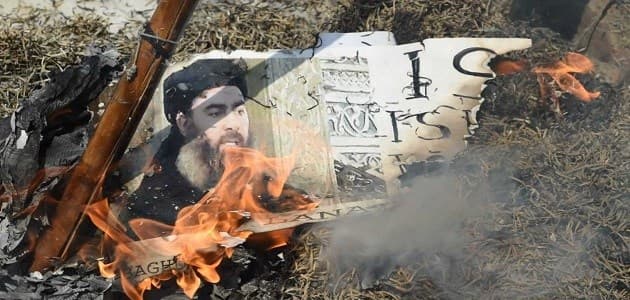 Portrait of the ISIS leader Abu Bakir al-Baghdadi burnt in a protest by Shiite Muslims in Pakistan following the ISIS-claimed attacks in Tehran in JUne 2017. Photo: AFP