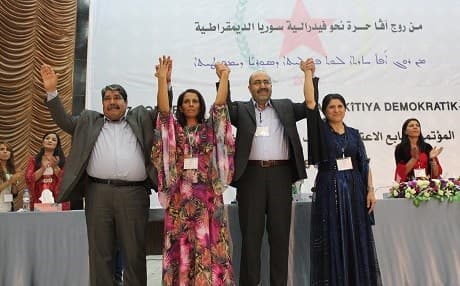 The PYD’s outgoing and incoming co-chairs, left to right: Saleh Moslem, Ayshe Hiso, Shahoz Hesen, and Asya Abdullah. Photo: PYD