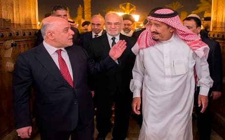 King Salman bin Abdulaziz al-Saud (R) greets Iraqi Prime Minister Haider al-Abadi upon his arrival in Riyadh on October 21, 2017. Photo: AFP/ Saudi Royal Palace/ Bandar Al-Jaloud