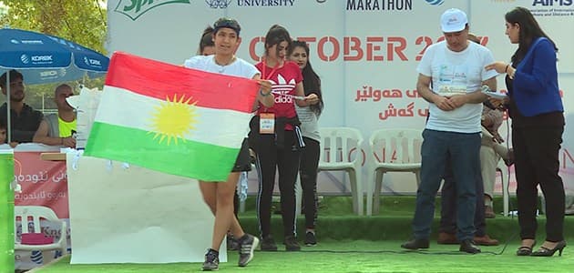 Amal Khidir, from Kirkuk, wins gold medal at ERbil International Marathon on October 27, 2017. Photo: Rudaw TV