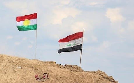 Kurdistan and Iraqi flags flying side-by-side on the Makhmour front. File photo: Farzin Hassan/Rudaw